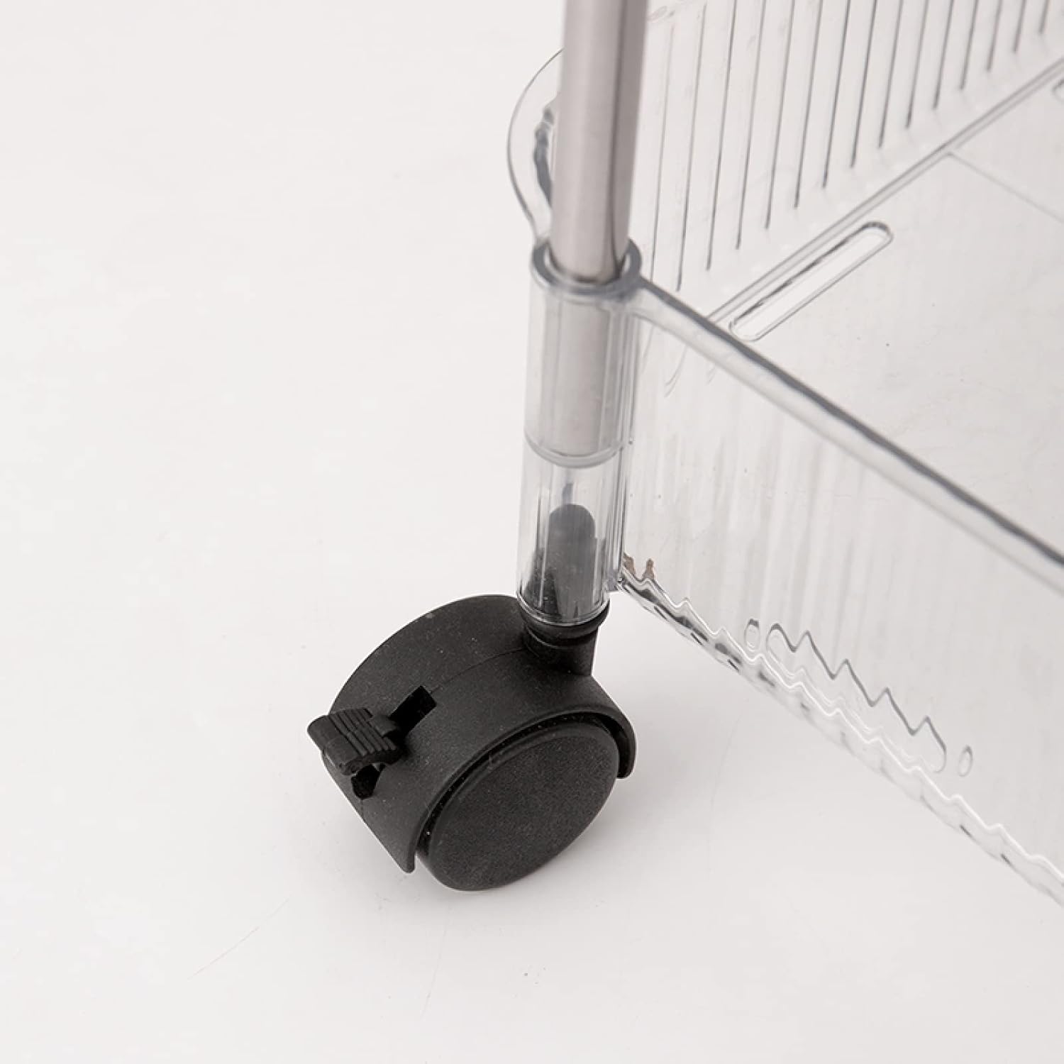 Black wheel of a 4-Tier Rolling Storage Cart.