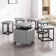5-in-1 Nesting Ottoman Stools are Arranged in a Living Area.