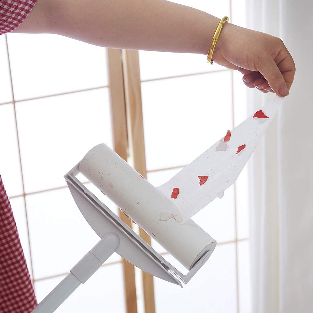 Someone peeling off Sticky Mop with Sticky Paper Roller, 60 Sheets