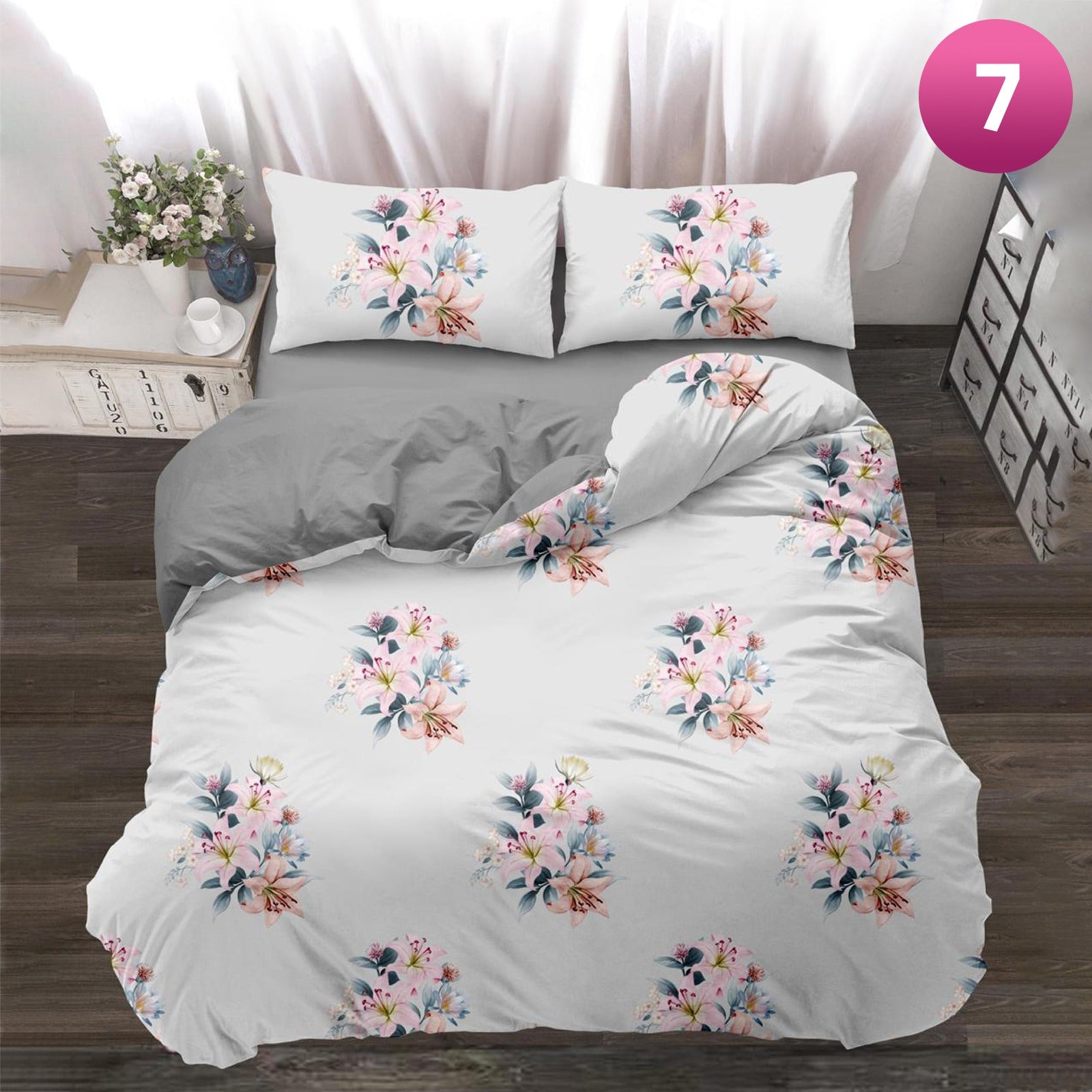 6-piece bedding set with floral comforter, fitted sheet, and pillow covers on a king bed.