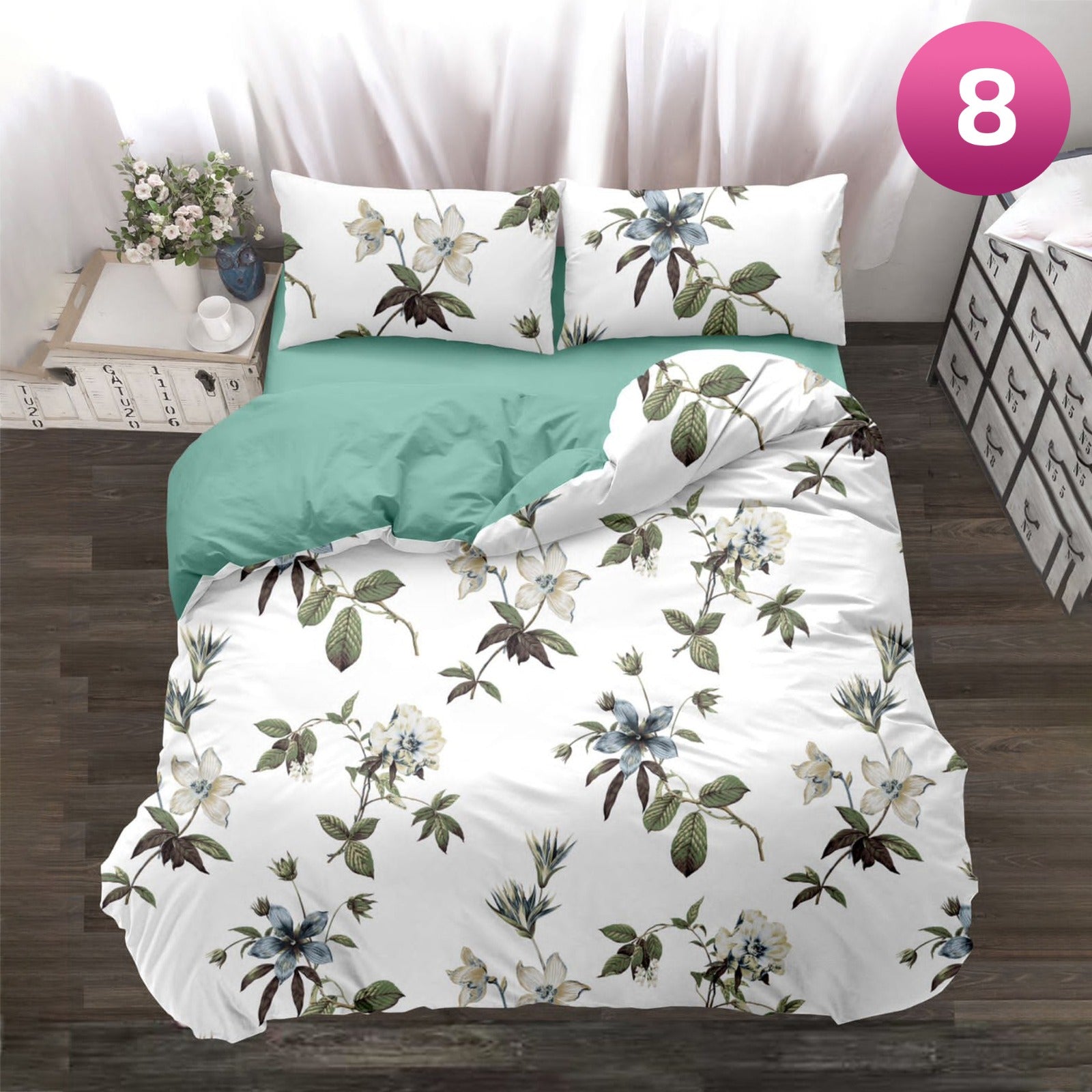 6-piece bedding set with floral comforter, fitted sheet, and pillow covers on a king bed.