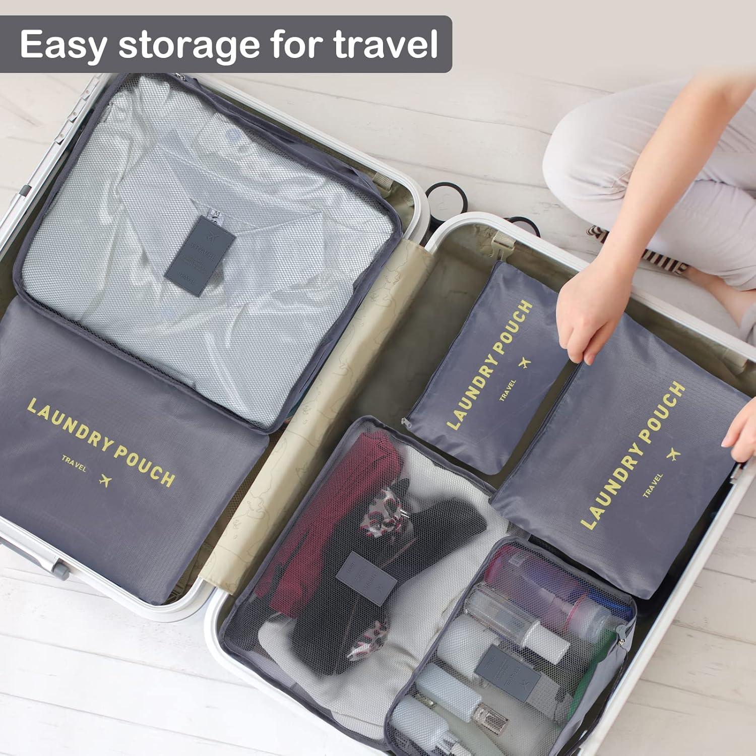 A Person is Arranging her Travel Bag Using 6 Pcs Travel Organizer Bag.