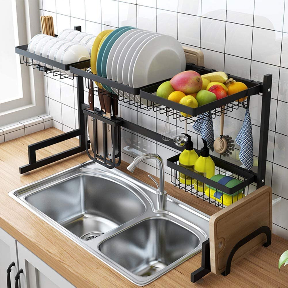 A dish rack with plates and dishes on it