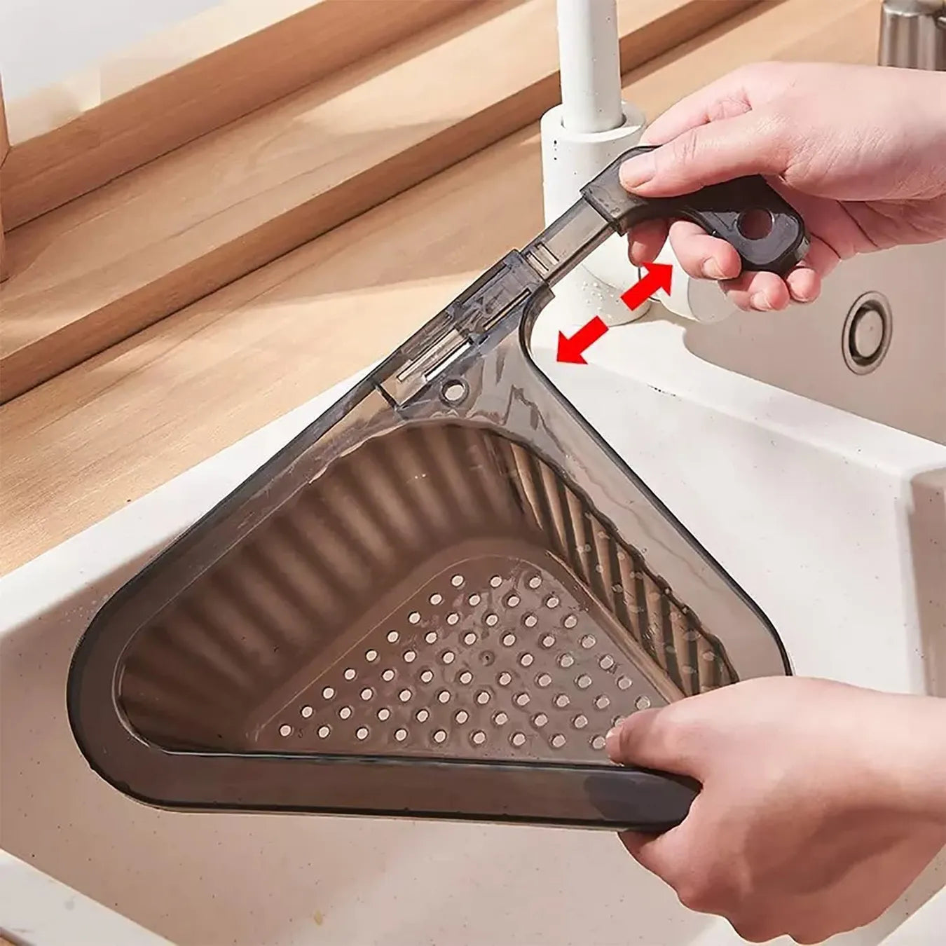 Someone holding Telescopic Sink Drain Basket