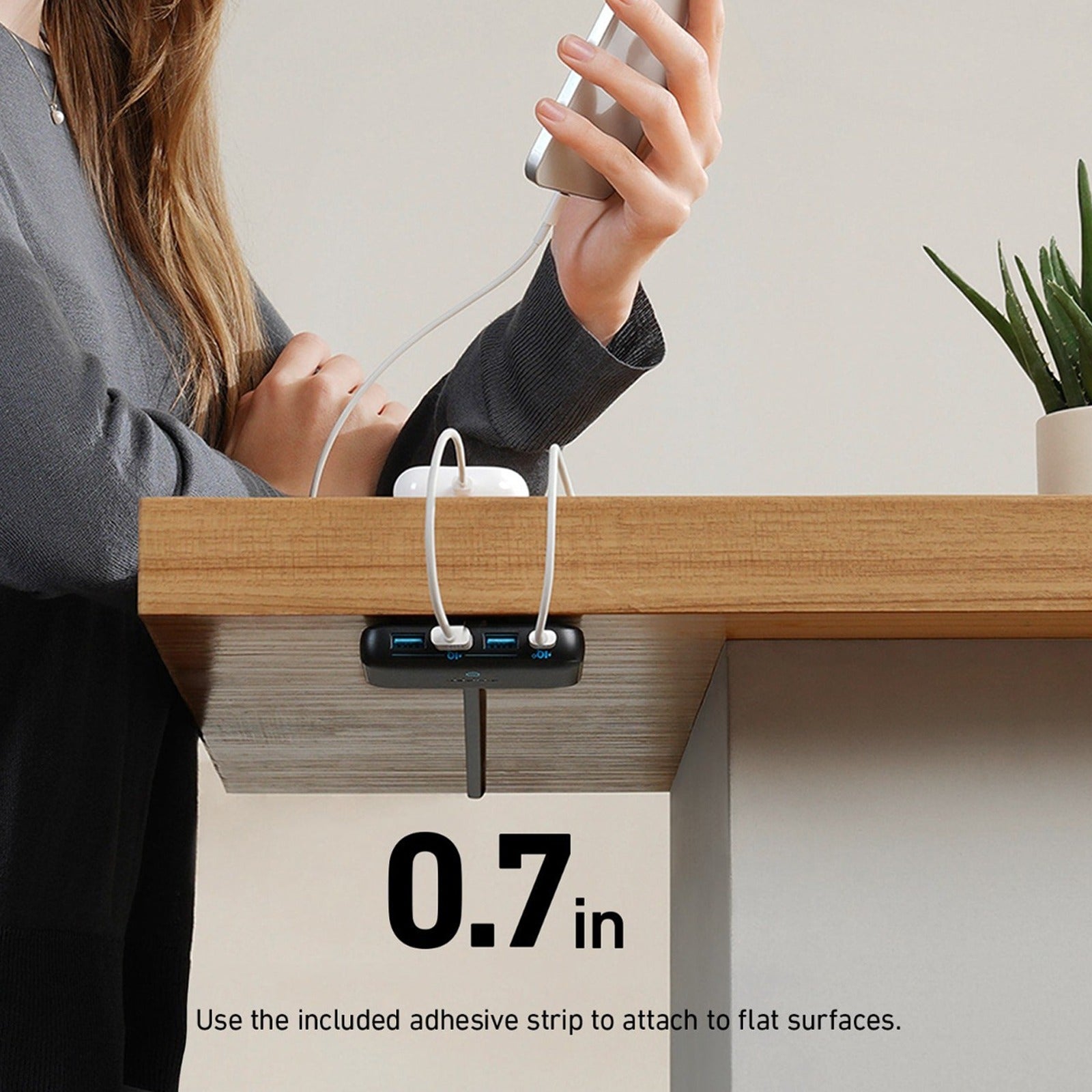 Anker PowerPort Atom 3 Slim 65W placed on the high-end of the table