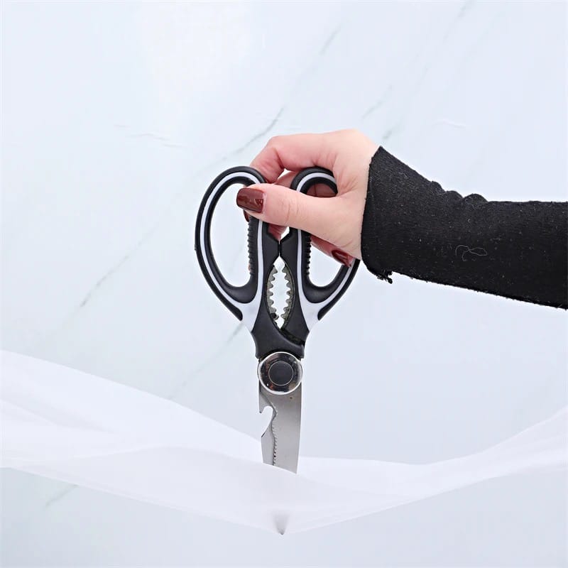 A Women is Trying To Cut Disposable Anti- Slip Wear Long Sleeve Glove.
