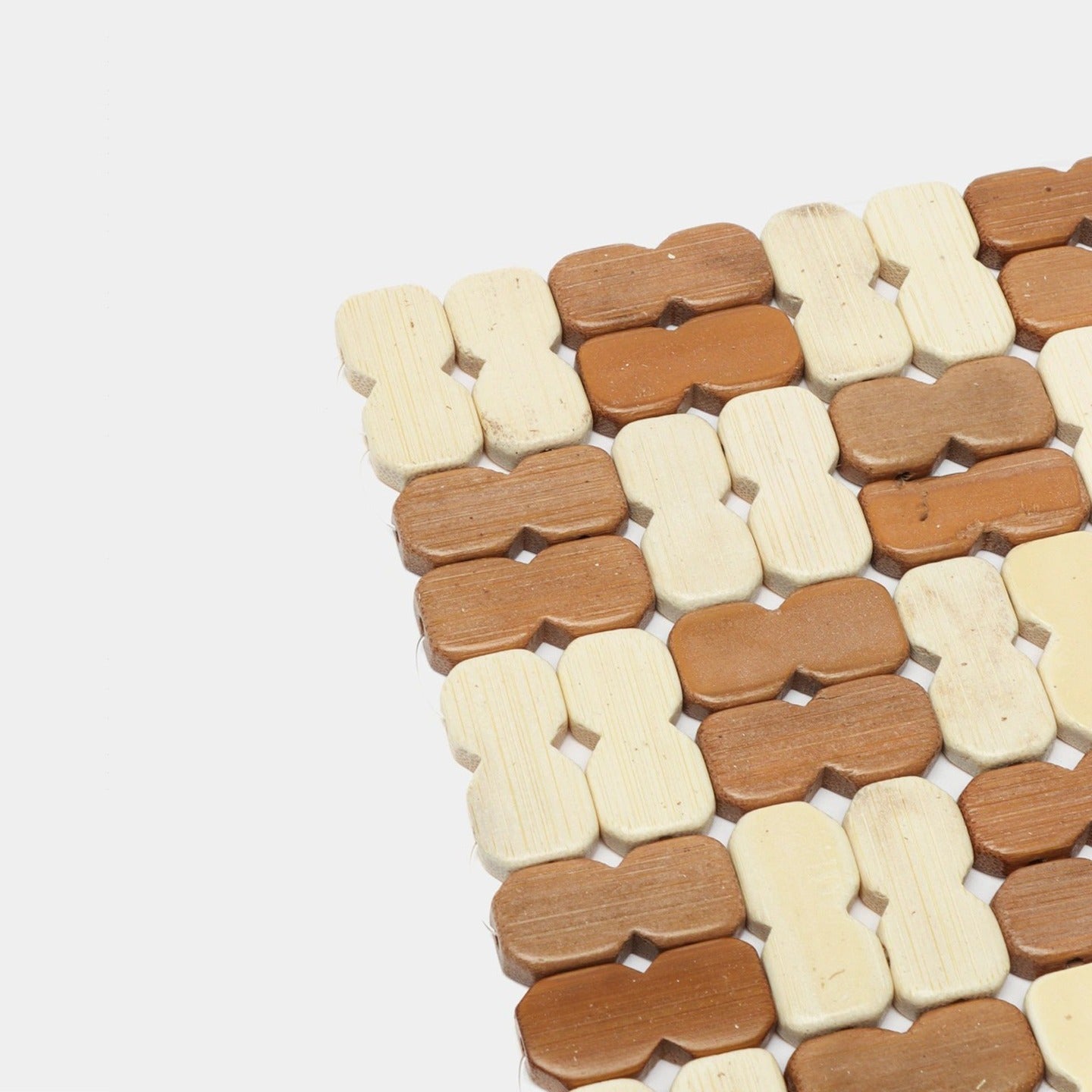 Natural Bamboo Heat Insulation Pad in beige and brown on a white background
