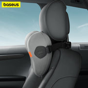 Baseus ComfortRide Car Headrest Neck Pillow is Attached on the Seat Of Car.