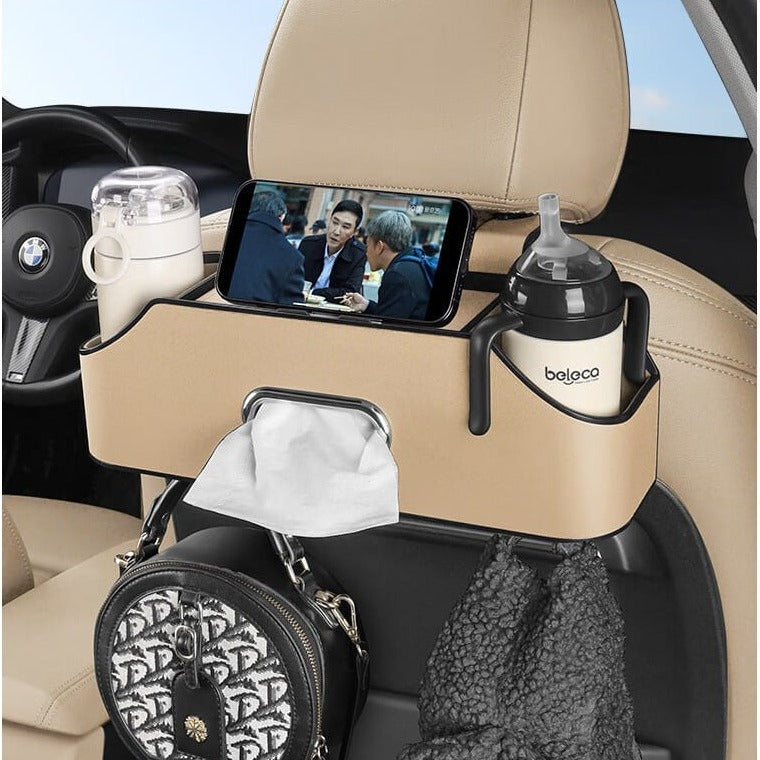 Beige Car Seat Headrest Storage Organizer Box Organized With Bottles and Tissues.