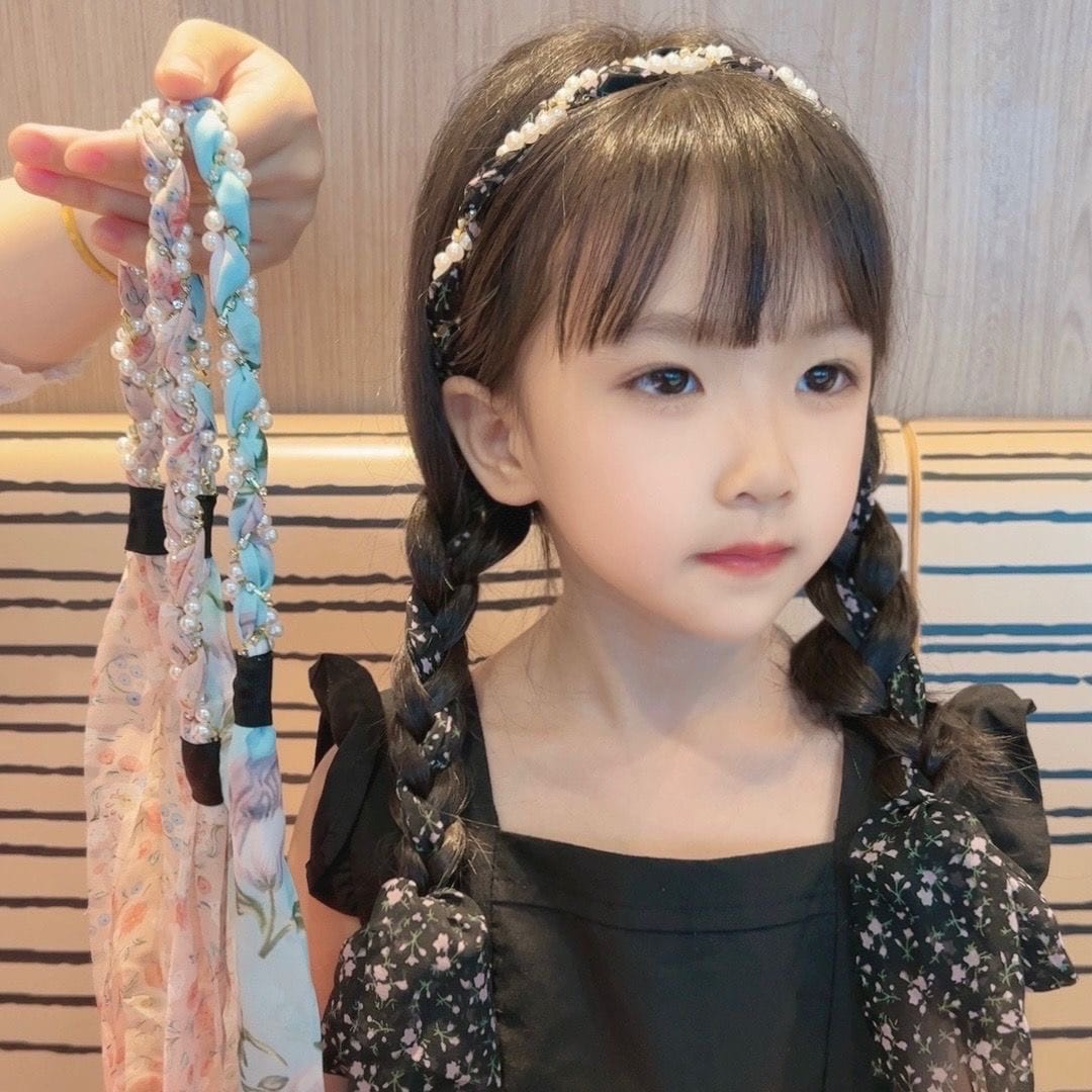 Cute Girl Wearing Braided Hairband.
