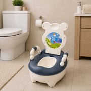 Children's potty chair with cartoon design in a bathroom setting