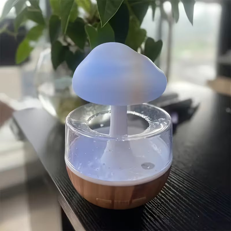Cloud Rain Humidifier on a table with a blurred background