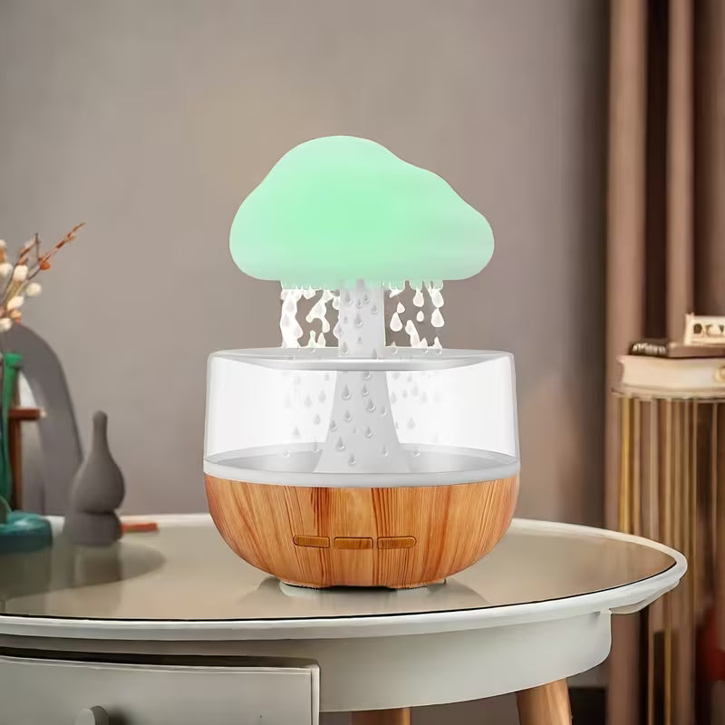 Cloud Rain Humidifier on a table with a blurred background