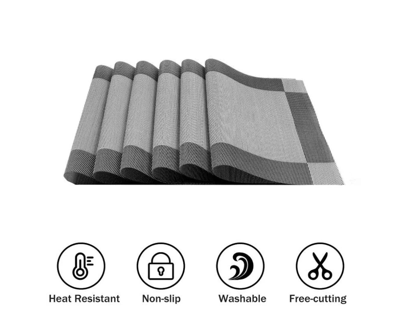 Set of gray placemats with checkered pattern on a white background