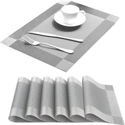 Dining Table Placemats with Cutlery on a White Background