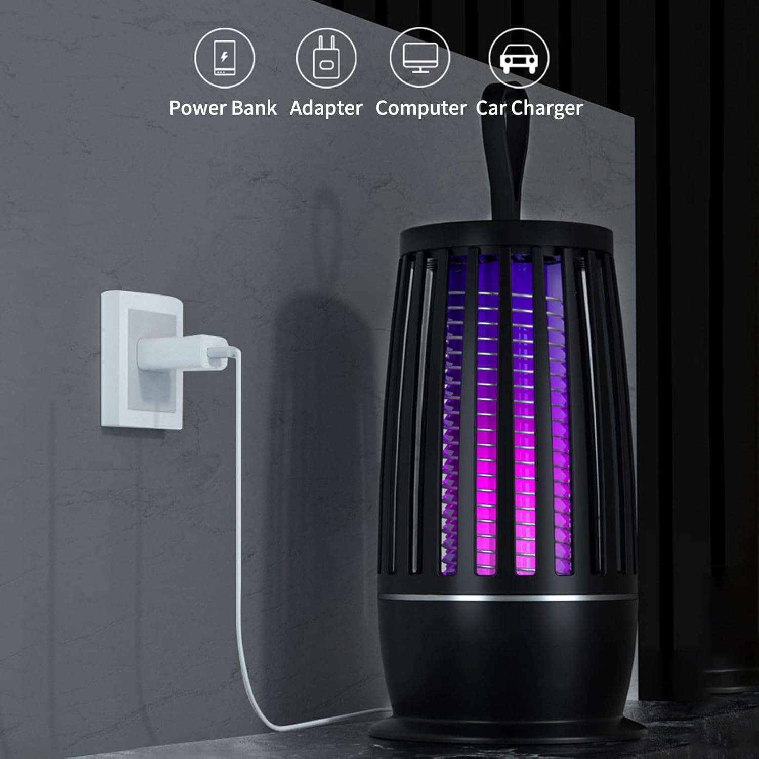 Black Electric Shock Mosquito Killer Lamp with purple lights connected to a power outlet on a gray background