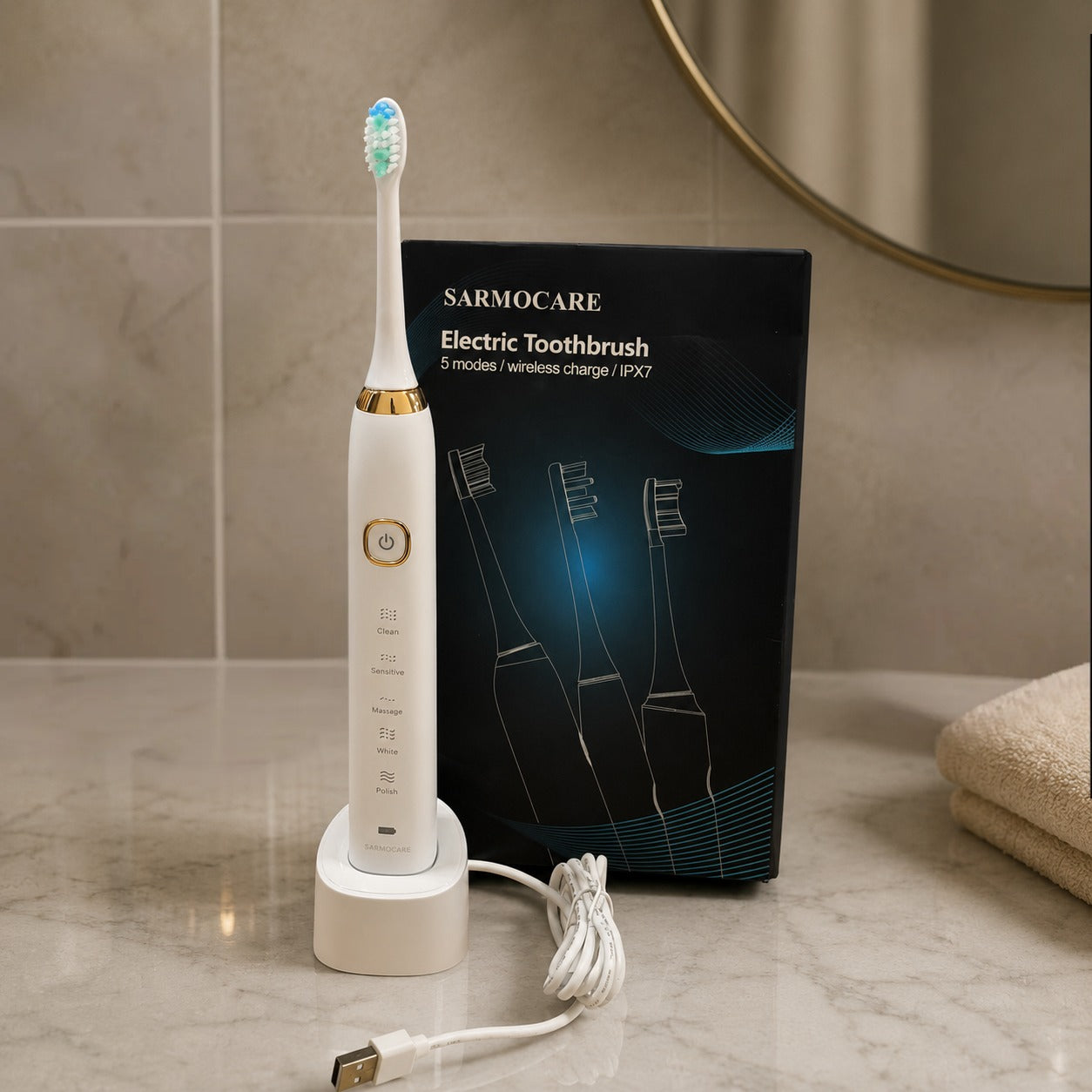 Sarmocare electric toothbrush with packaging on a bathroom counter