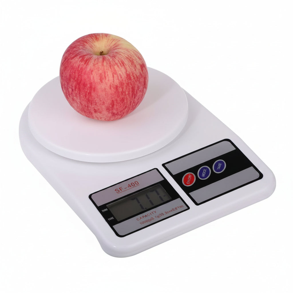 A digital kitchen scale with a fresh apple, displayed on a clean white background.