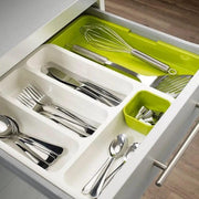 Kitchen Spoons and Cutleries are Kept at Expandable Cutlery Tray.