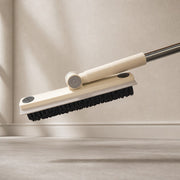 Floor Gap Cleaning Brush with a black bristle head and beige handle on a neutral background