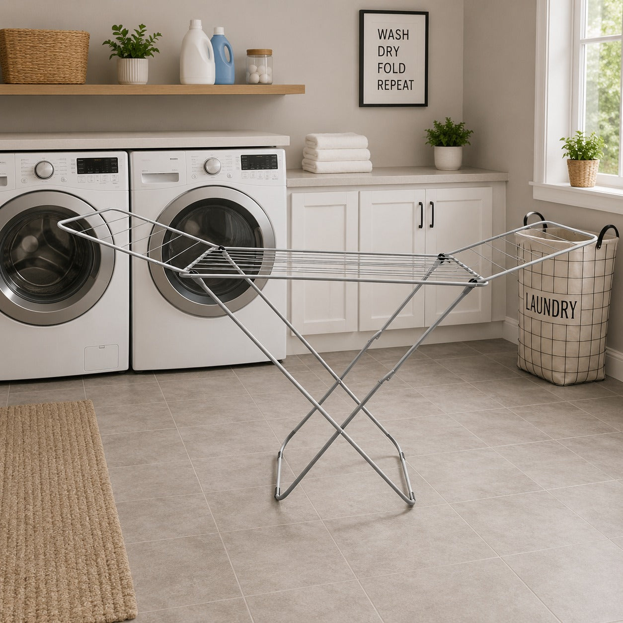 Laundry room with washing machines, dryer, and a Heavy Duty Foldable Clothes Drying Rack