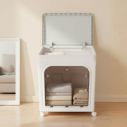 A Foldable Storage Box is arranged with clothes.