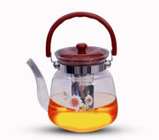 A Glass Tea Jug & Coffee Pot with Tea.