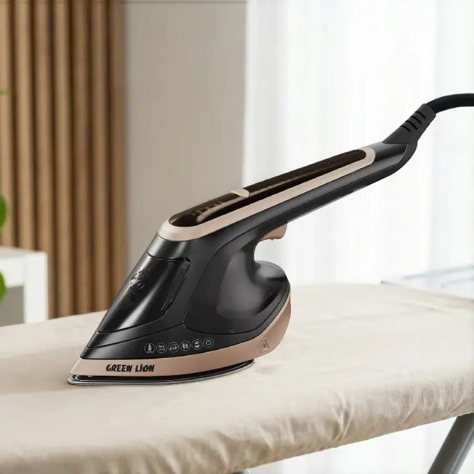 Green Lion 2-in-1 Steam Iron Garment Steamer on a white surface with a blurred background