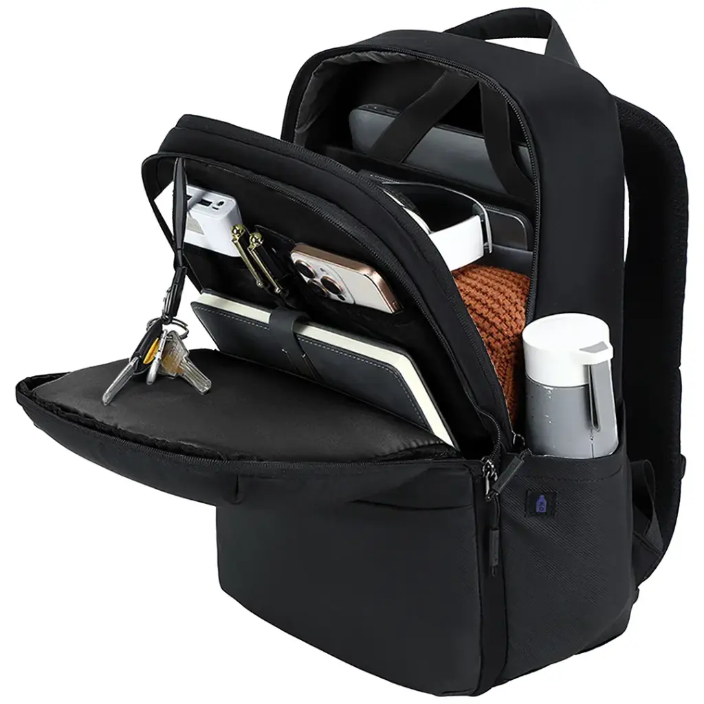 Black Green Lion Smithfield Laptop Backpack with various items, including a phone, wallet, and water bottle.
