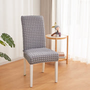 A Chair is Covered With Grey Bubble Stuff Stretchable Chair Cover 