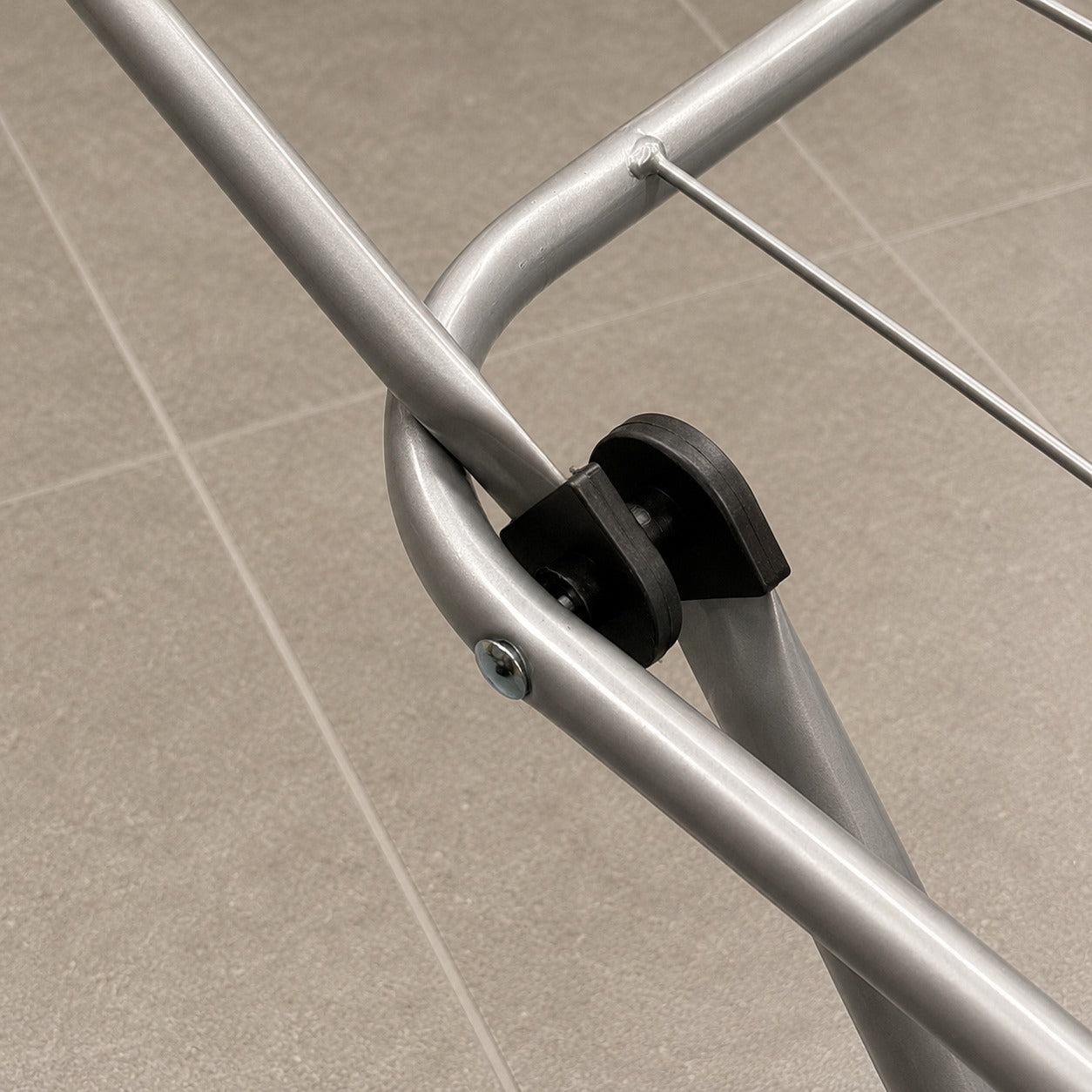 Close-up of a metal frame of Heavy Duty Foldable Clothes Drying Rack.