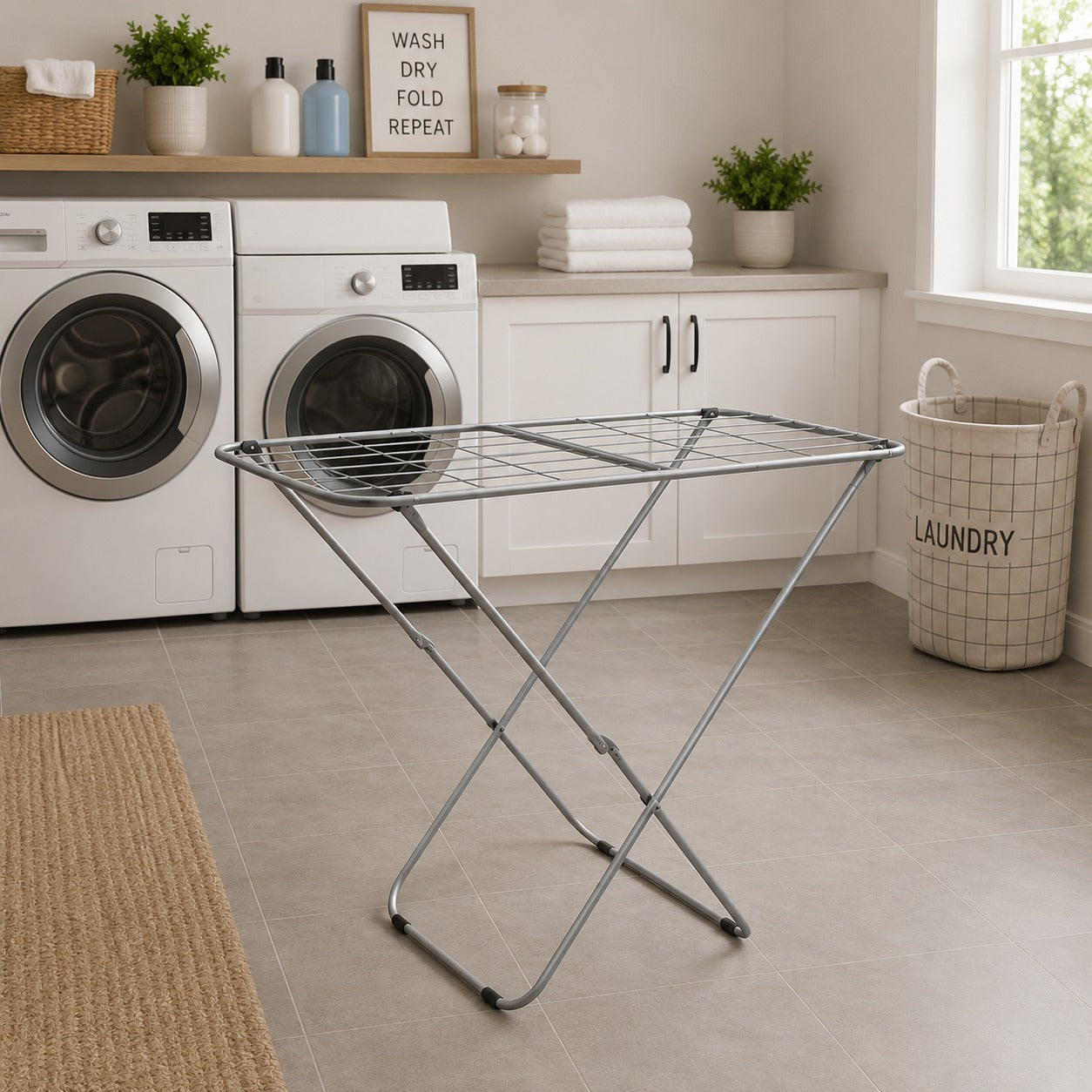 Laundry room with a Heavy Duty Foldable Clothes Drying Rack in front of washing machines.