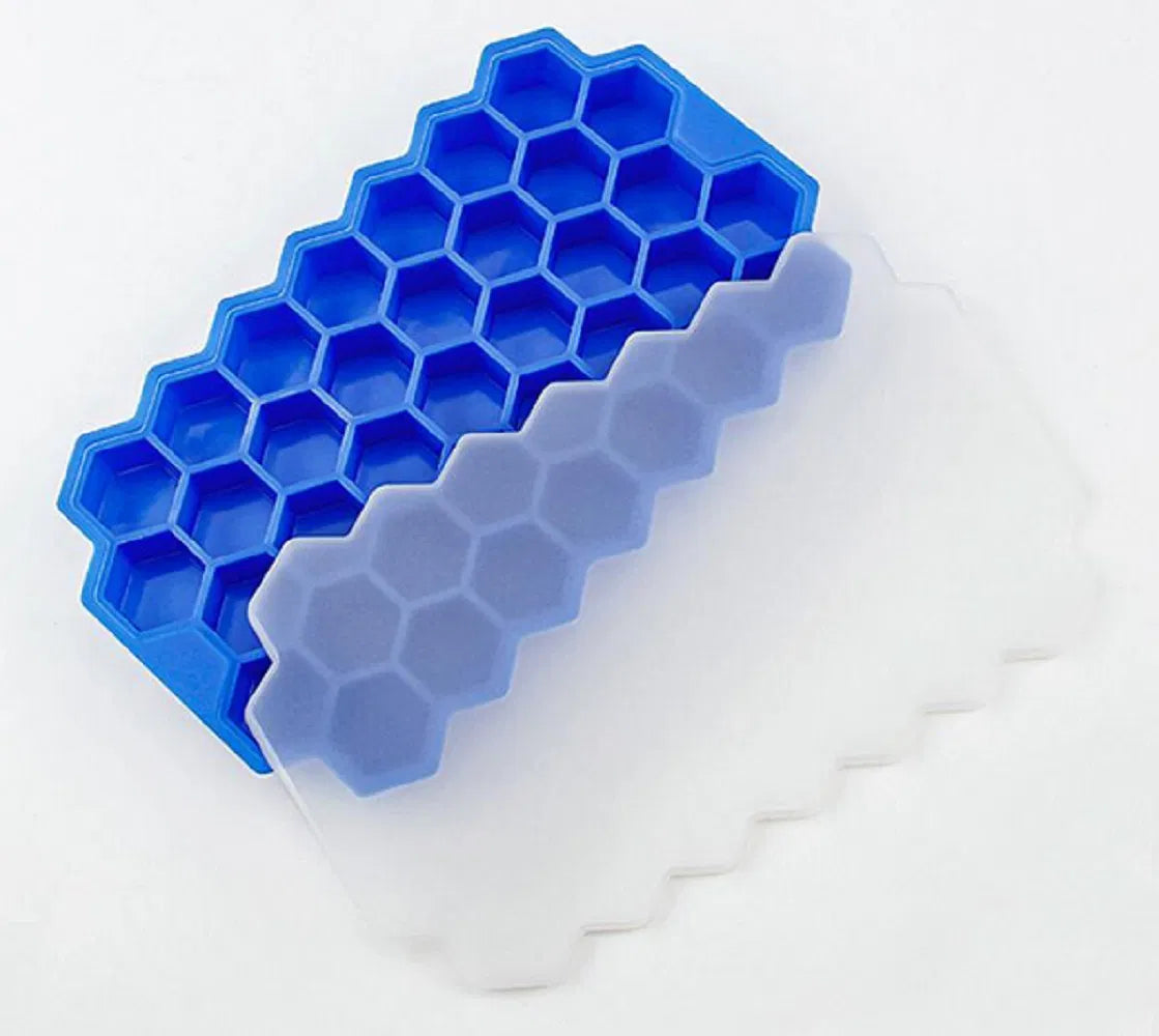 Blue honeycomb silicone ice cube tray on a white background