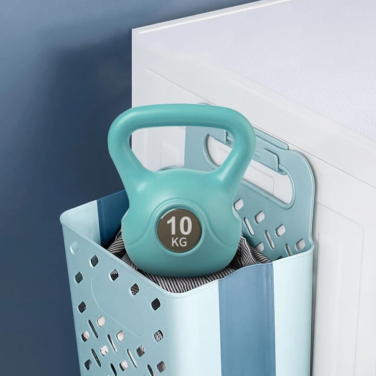 Collapsible Wall Mount Laundry Basket with some items in it