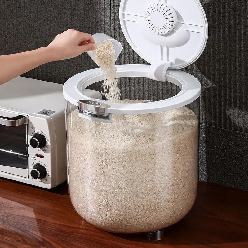 Someone pouring rice into the Transparent Moisture-Proof Sealed Tank Storage Bucket for Rice
