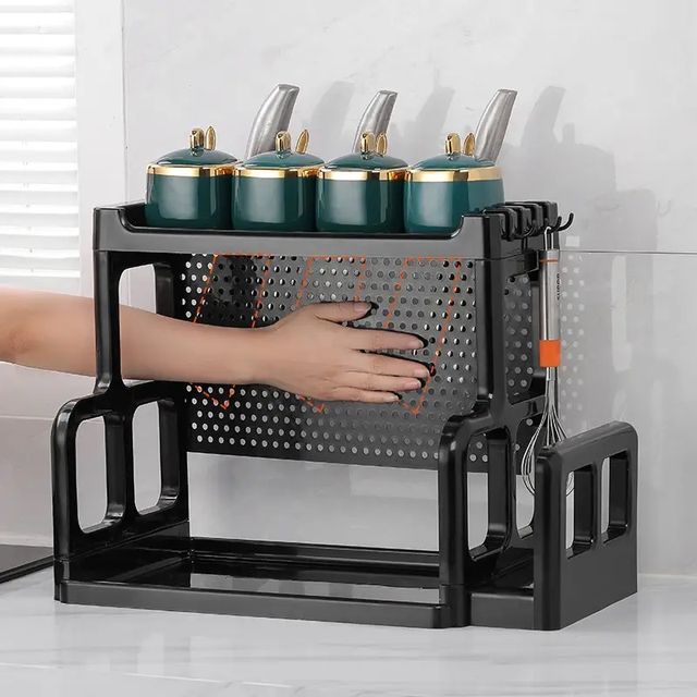 Someone is touching their hand to the Double Layer Spices Organizer Storage Rack