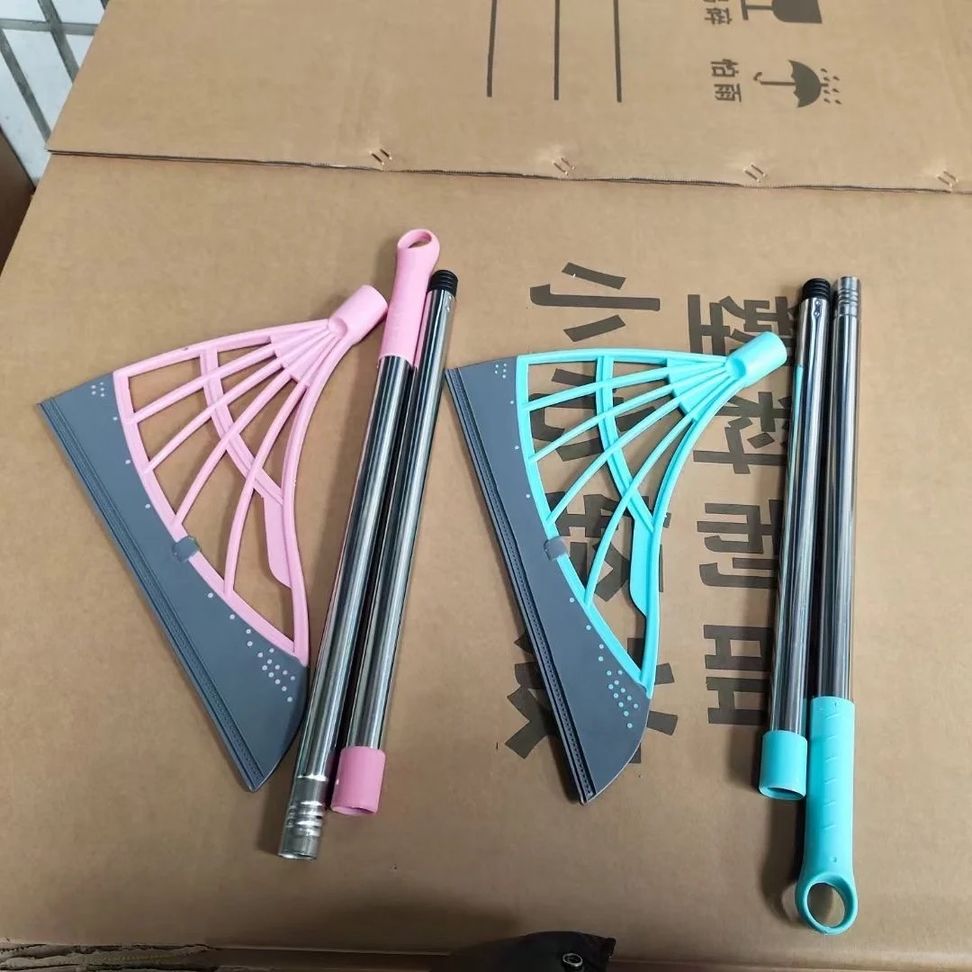 Multifunction Magic Broom placed on the cardboard without fitting