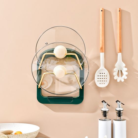 The Useful Kitchen 2 Tier Pot Lid Pan Holder Shelf is placed on the wall