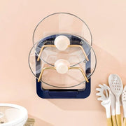 The Useful Kitchen 2 Tier Pot Lid Pan Holder Shelf is placed on the wall