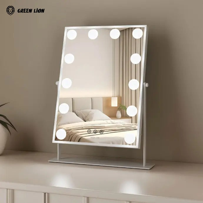 Green Lion Glam Shine Makeup Mirror with lights on a dresser against a neutral wall