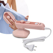 A person is using Pink handheld steamer with power cord on a white background