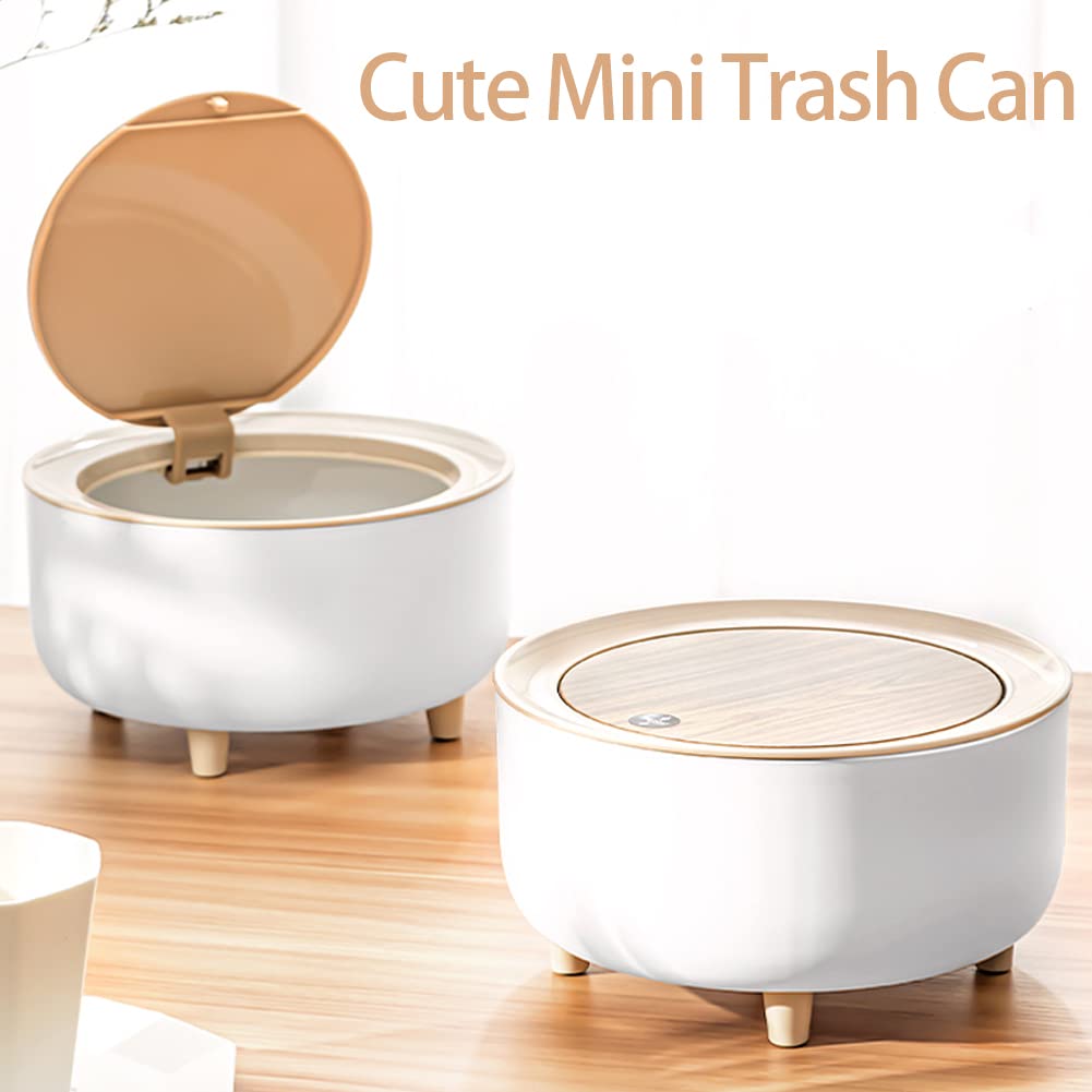 Pair of Mini Trash Can kept in a wooden surface.