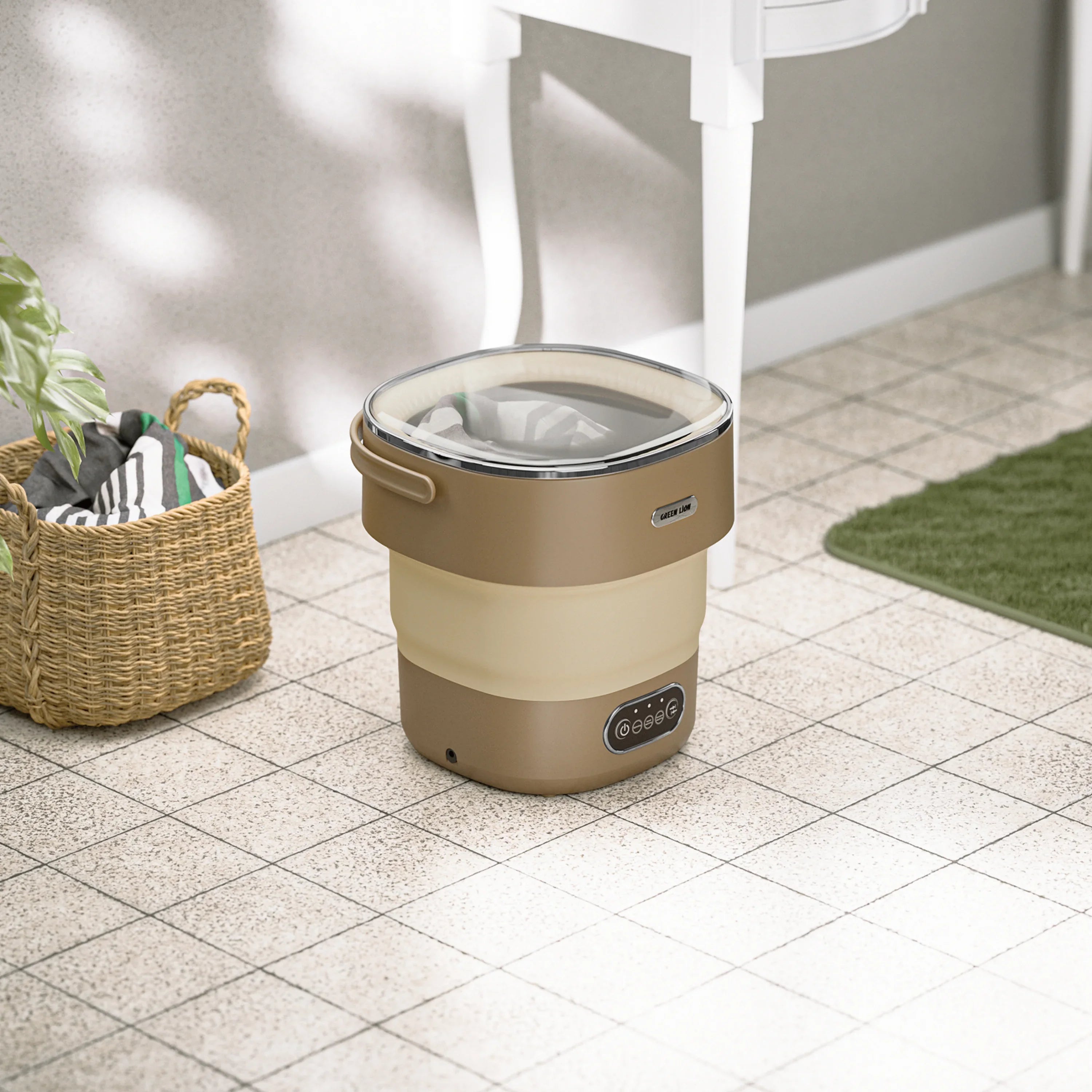 Green Lion Fold Wash Mini Washing Machine on a tiled bathroom floor next to a toilet.