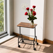Mobile Side Table with Storage Basket with a vase of red roses
