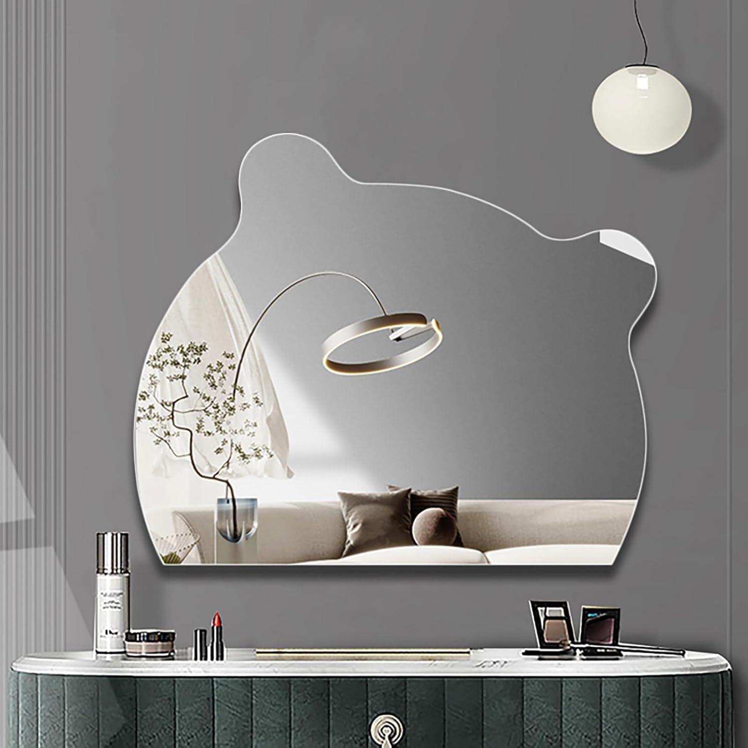A Modern LED Bathroom Mirror is Fixed on the Wall Of Makep Area. 