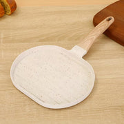 Multi-Functional Breakfast Frying Pan with wooden handle on a wooden surface