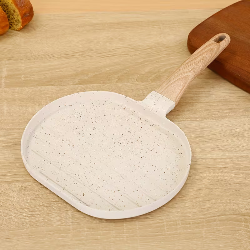 Multi-Functional Breakfast Frying Pan with wooden handle on a wooden surface