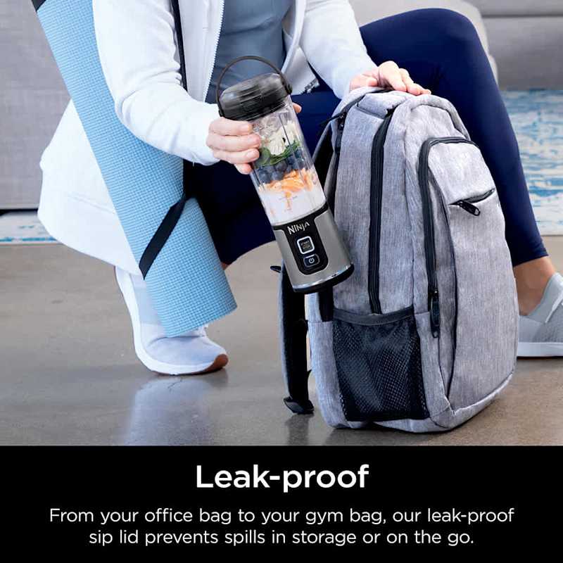 A Person is Keeping Ninja Blast Portable Blender to Bag.