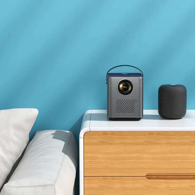 Pawa Mini Projector Magnifier Series 1080p Placed On a Table.