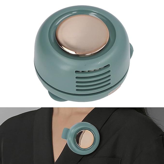 A Person is Attached Pocket Clip Fan On his Dress.